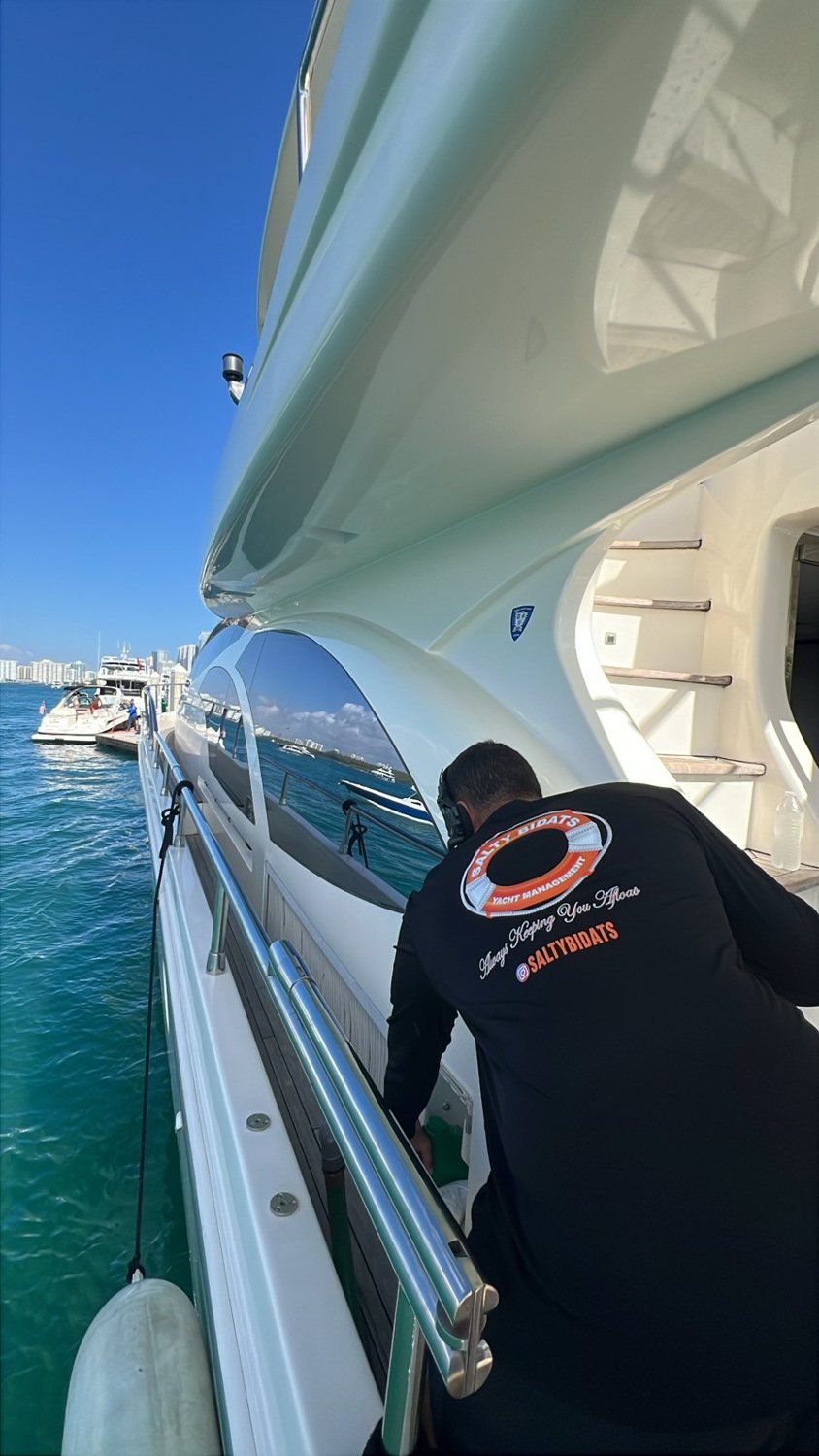 Salty Bidats Yacht Management crew at work on a client vessel