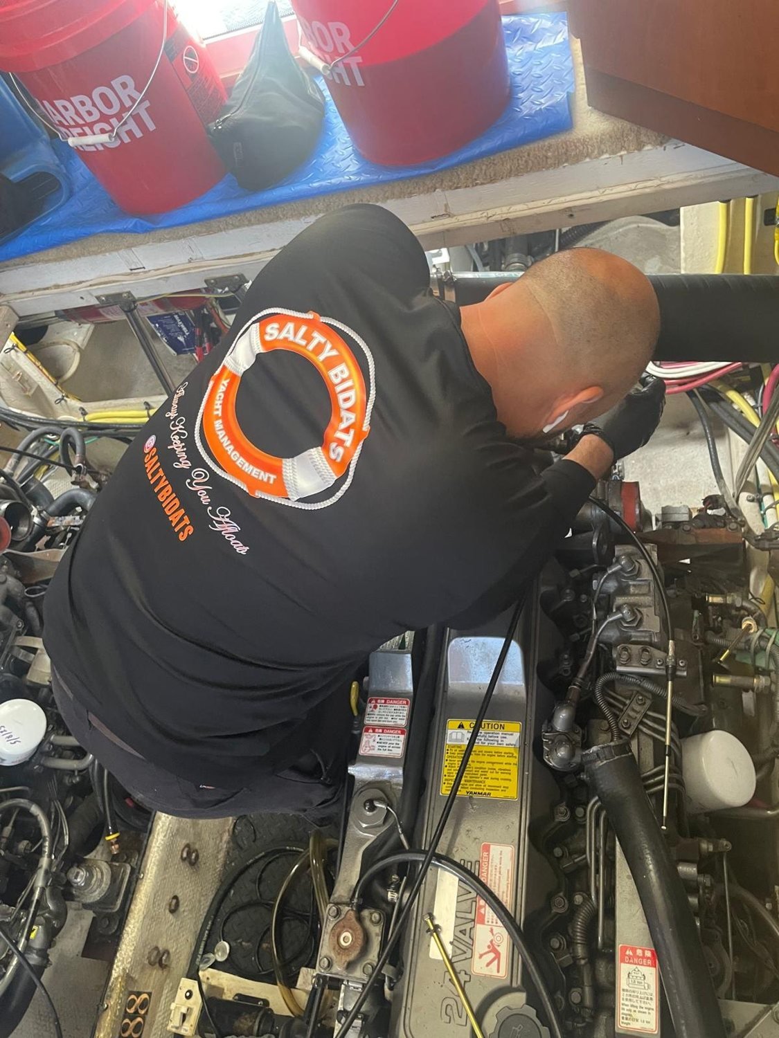 Salty Bidats Yacht Management crew at work on a client vessel