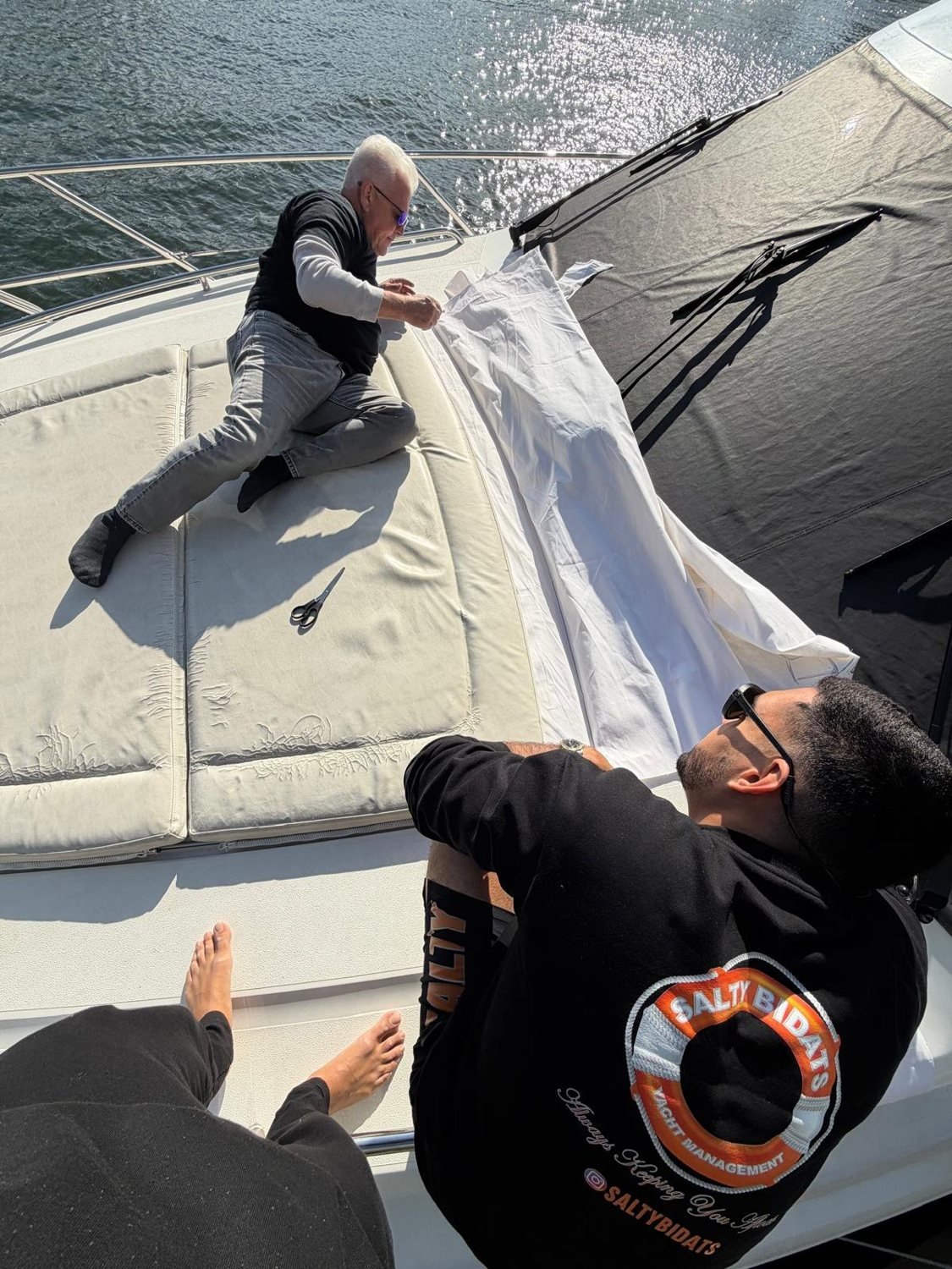 Salty Bidats Yacht Management crew at work on a client vessel