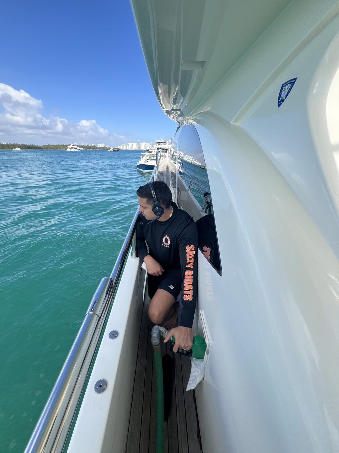 Salty Bidats Yacht Management crew at work on a client vessel